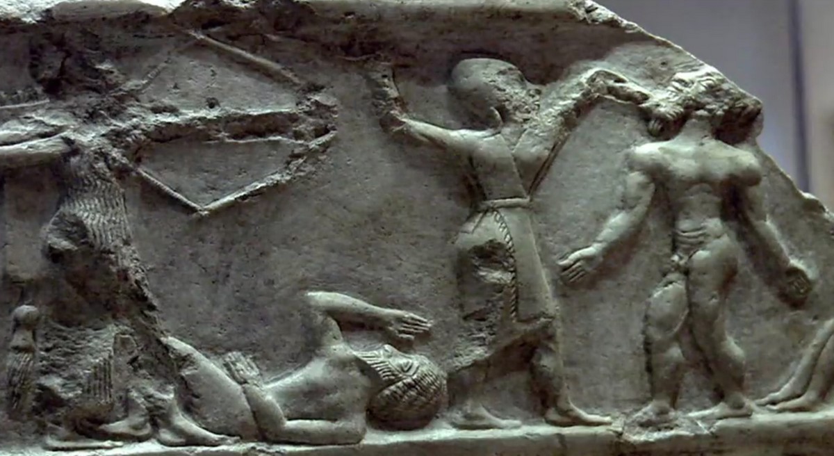 Ein Krieger packt seinen Feind am Bart, damit er gezielter auf ihn einschlagen kann. Stele aus Uruk (Ausschnitt). Ein Krieger packt seinen Feind am Bart, damit er gezielter auf ihn einschlagen kann. Stele aus Uruk (Ausschnitt).